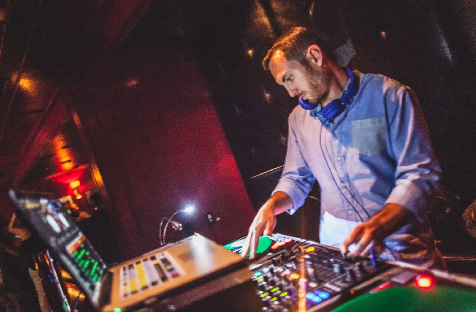 DJ Maple Syrup mixing at a corporate event